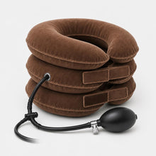 Coffee brown cervical traction collar seen from behind, showing the adjustable straps and the inflation tube with hand pump