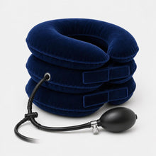 Navy blue inflatable cervical traction collar, three-quarter rear view showing the adjustable velcro straps and inflation tube