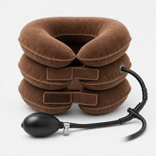 Inflatable cervical neck traction collar in coffee brown velvet, front view with three air chambers, velcro straps and hand pump